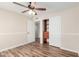 The bedroom includes wood floors and closet with drawers at 14815 N 21St St, Phoenix, AZ 85022