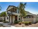 Charming home with a welcoming porch, low-maintenance landscaping, and a modern design at 1635 N 208Th Ave, Buckeye, AZ 85396