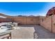 Spacious backyard with a retractable awning that provides shade and a play structure at 17606 N 17Th Pl # 1054, Phoenix, AZ 85022