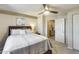Bedroom highlighting a comfortable bed, with soft lighting, neutral color scheme, and opening to the hallway at 17606 N 17Th Pl # 1054, Phoenix, AZ 85022