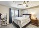 Bedroom showcasing a large window, soft lighting, and soothing neutral tones, creating a relaxing atmosphere at 17606 N 17Th Pl # 1054, Phoenix, AZ 85022