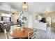 Open-concept area with a dining space adjacent to the kitchen and living room, perfect for entertaining at 17606 N 17Th Pl # 1054, Phoenix, AZ 85022