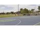Community basketball court with green and blue surface for neighborhood recreation at 17810 W Marshall Ln, Surprise, AZ 85388