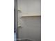 Walk in closet with wooden bars and shelves at 17810 W Marshall Ln, Surprise, AZ 85388