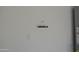 View of a garage wall featuring an electrical outlet and a support bar at 17810 W Marshall Ln, Surprise, AZ 85388