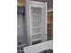 Spacious walk-in pantry with white shelving and an open door for convenient storage at 17810 W Marshall Ln, Surprise, AZ 85388