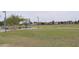 Community playground with fitness equipment and green space for Gathering fun at 17810 W Marshall Ln, Surprise, AZ 85388