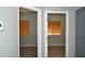 Two rooms with wood floors visible through open doorways at 17810 W Marshall Ln, Surprise, AZ 85388