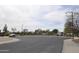 Street view of neighborhood park and parking, with well-maintained landscaping at 17810 W Marshall Ln, Surprise, AZ 85388