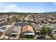 Aerial view of the homes in a neighborhood, surrounded by desert landscaping at 18058 W Weatherby Dr, Surprise, AZ 85374