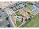Aerial view of community park featuring sport courts, playground, and parking at 18525 N Larkspur Dr, Maricopa, AZ 85138
