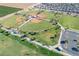 An aerial shot of the community park showcasing baseball fields, walkways, and meticulously landscaped areas at 18525 N Larkspur Dr, Maricopa, AZ 85138