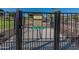 Dog park with secure fencing, visible signage, and open space for pets to play and exercise safely at 18525 N Larkspur Dr, Maricopa, AZ 85138