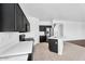 Contemporary kitchen featuring bright countertops, stainless steel appliances, and modern fixtures at 18525 N Larkspur Dr, Maricopa, AZ 85138