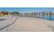 Beautiful lakeside view with a scenic overlook, featuring a modern railing and access stairs for easy enjoyment of waterfront views at 18525 N Larkspur Dr, Maricopa, AZ 85138