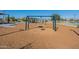 Fun-filled playground with swings and soft landing, providing a safe and enjoyable recreational space for children in the community at 18525 N Larkspur Dr, Maricopa, AZ 85138