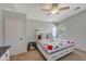 The bedroom features a full size bed with drawers for storage at 18590 W Vogel Ave, Goodyear, AZ 85338