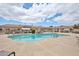Beautiful community pool with clean water, comfortable lounge chairs, and well-maintained landscaping at 18650 N 91St Ave # 3701, Peoria, AZ 85382