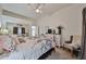 Spacious main bedroom with carpet, closet with mirror, and soft, natural light at 18650 N 91St Ave # 3701, Peoria, AZ 85382