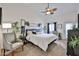 Main bedroom featuring plush carpet, large windows, and a decorative ceiling fan for comfort and style at 18650 N 91St Ave # 3701, Peoria, AZ 85382