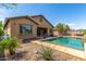 Charming home featuring a private pool and landscaped backyard, perfect for relaxation and outdoor enjoyment at 20592 E Reins Rd, Queen Creek, AZ 85142