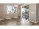 Dining room featuring a modern chandelier and sliding door to the back yard at 20592 E Reins Rd, Queen Creek, AZ 85142