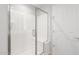 Walk-in shower features glass enclosure and built-in bench at 21352 N 271St Dr, Buckeye, AZ 85396
