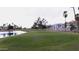 Picturesque golf course view with manicured lawns and waterfront homes in the background at 21474 N 56Th Ave, Glendale, AZ 85308