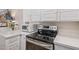 Modern kitchen appliances and white cabinets, stainless oven at 21474 N 56Th Ave, Glendale, AZ 85308