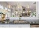 Kitchen island with a modern sink and pendant lights, perfect for food prep at 21474 N 56Th Ave, Glendale, AZ 85308