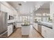 Beautiful kitchen with white cabinets, granite countertops, and stainless steel appliances at 21474 N 56Th Ave, Glendale, AZ 85308