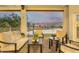Inviting covered patio with views of the lake, featuring comfortable seating for relaxing evenings at 21474 N 56Th Ave, Glendale, AZ 85308