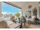Comfortable patio seating overlooking a tranquil water view, perfect for relaxing outdoors at 21474 N 56Th Ave, Glendale, AZ 85308