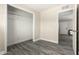 Bedroom with closet and view to the hall at 2221 E Lynne Ln, Phoenix, AZ 85042