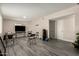 Spacious living area with modern flooring, neutral walls, and ample natural light at 2221 E Lynne Ln, Phoenix, AZ 85042