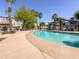 Relaxing community pool with a shady gazebo, perfect for unwinding and enjoying the outdoors at 2314 E Hidalgo Ave, Phoenix, AZ 85040