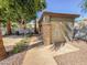 Outdoor shower facility near the pool area offers convenience with stone and tile accents at 2314 E Hidalgo Ave, Phoenix, AZ 85040
