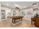 Elegant game room featuring a pool table, a piano, and tile flooring at 2553 E Carob Dr, Gilbert, AZ 85298