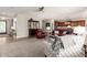 Cozy living room features an open floor plan, tile floors, and comfortable furnishings at 2553 E Carob Dr, Gilbert, AZ 85298