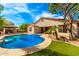 Backyard featuring a pool, gazebo and outdoor furniture at 2553 E Carob Dr, Gilbert, AZ 85298