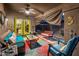 Covered patio space with comfortable seating and a hanging swing, perfect for relaxing outdoors at 25821 N 41St Dr, Phoenix, AZ 85083
