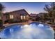 Sparkling backyard pool with a spacious patio area, perfect for entertaining or relaxing in the desert landscape at 25821 N 41St Dr, Phoenix, AZ 85083