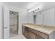 Bathroom featuring double sinks, granite counters, and modern lighting at 2619 S Los Altos --, Mesa, AZ 85202
