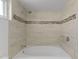 Bathroom features a shower-over-tub with decorative tiling at 2619 S Los Altos --, Mesa, AZ 85202