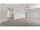 Spacious bedroom features a walk-in closet, neutral carpet, and access to an ensuite bathroom at 2619 S Los Altos --, Mesa, AZ 85202