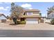 Charming two-story brick home featuring a two-car garage and desert landscaping in front yard at 2619 S Los Altos --, Mesa, AZ 85202