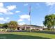 Exterior of the community golf shop with manicured lawn and an American flag at 2619 S Los Altos --, Mesa, AZ 85202
