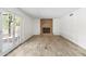 Bright living area features white walls, tile floor, and red brick fireplace at 2619 S Los Altos --, Mesa, AZ 85202