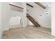 Bright living area with vaulted ceilings, wood beams, and wood-look tile flooring at 2619 S Los Altos --, Mesa, AZ 85202