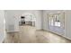 Bright living room with archway to kitchen and French doors opening to the pool area at 2619 S Los Altos --, Mesa, AZ 85202